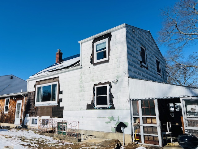 James Harding Siding before